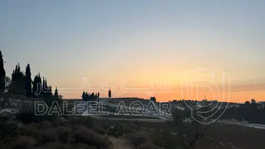 أرض في بلعاس - يبعد 6 دقائق عن طريق المطار - 175,000 دأ - صورة NaN
